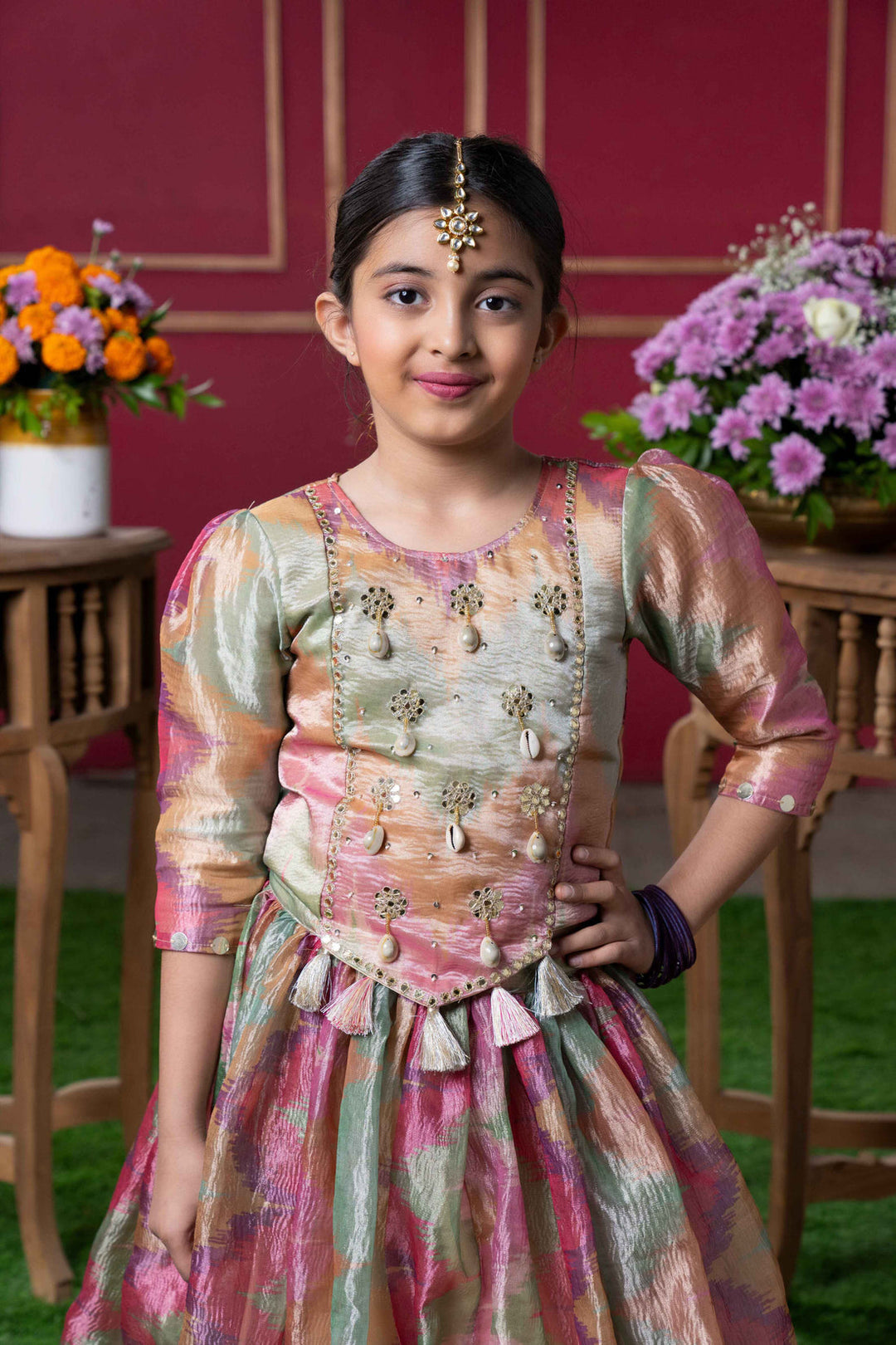 Shimmering Pastel Embroidered Top and Lehenga Set with Matching Potli Bag