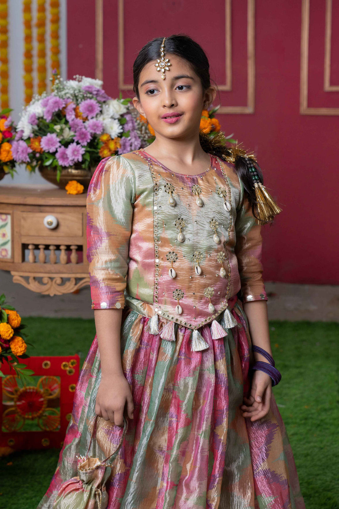 Shimmering Pastel Embroidered Top and Lehenga Set with Matching Potli Bag